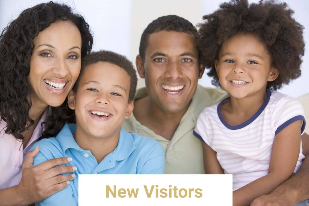 Family in living room smiling